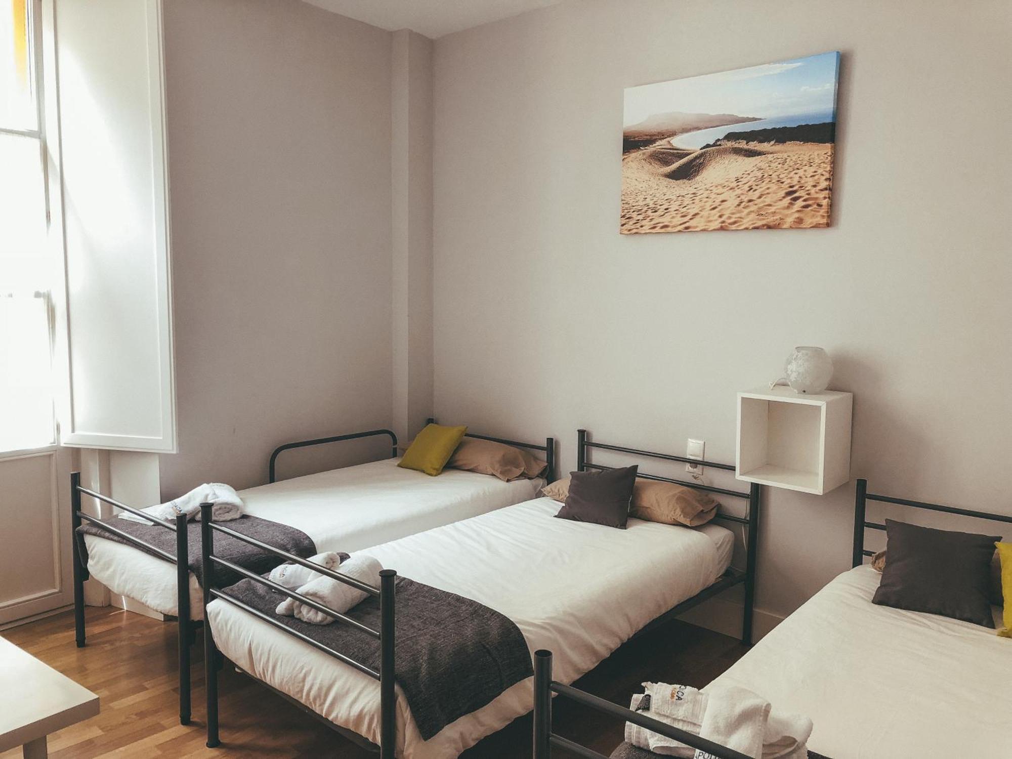 Chambre Triple avec Salle de Bains Commune